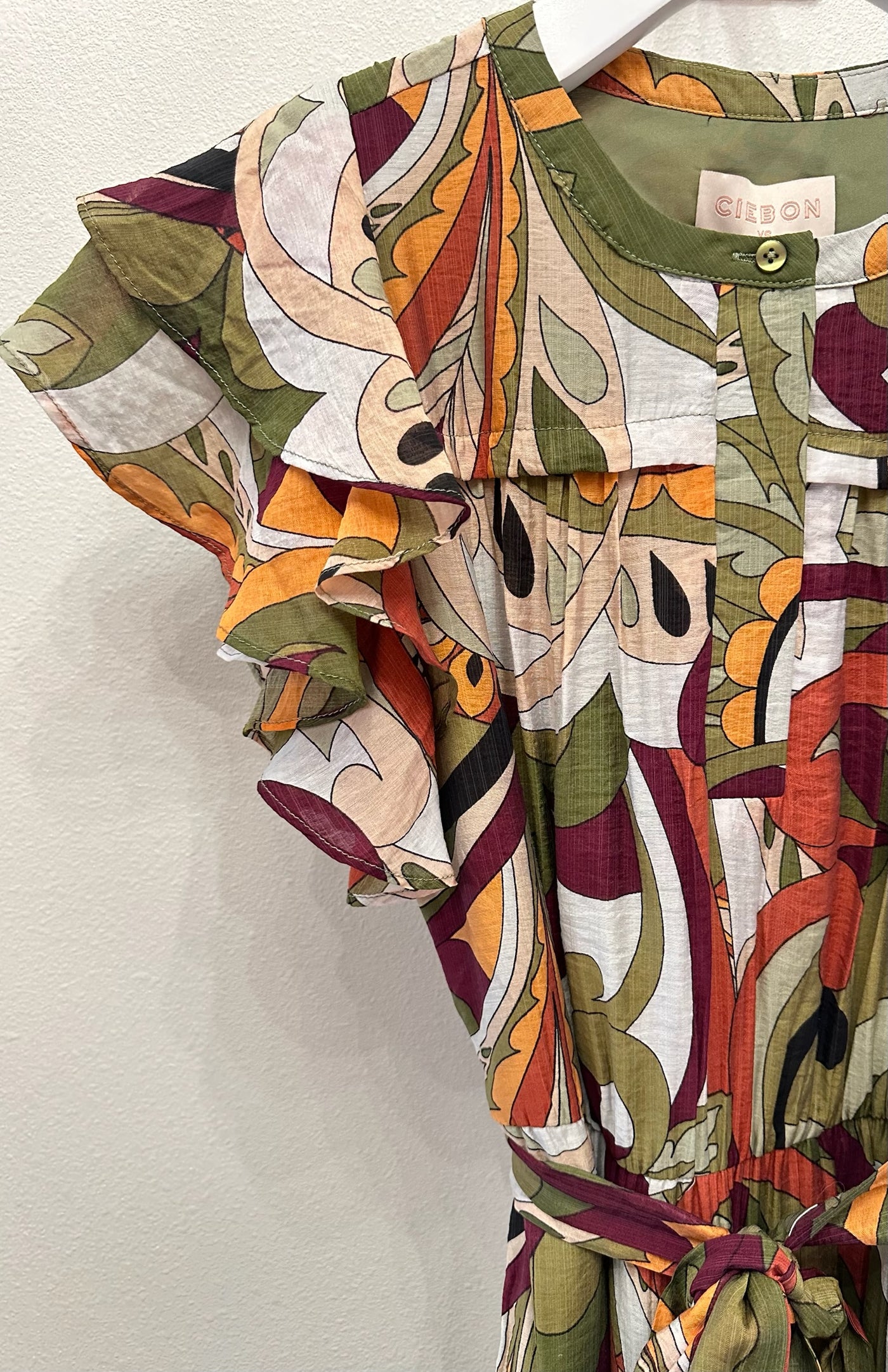 Nythia Printed Flutter Midi Dress in Green Multi